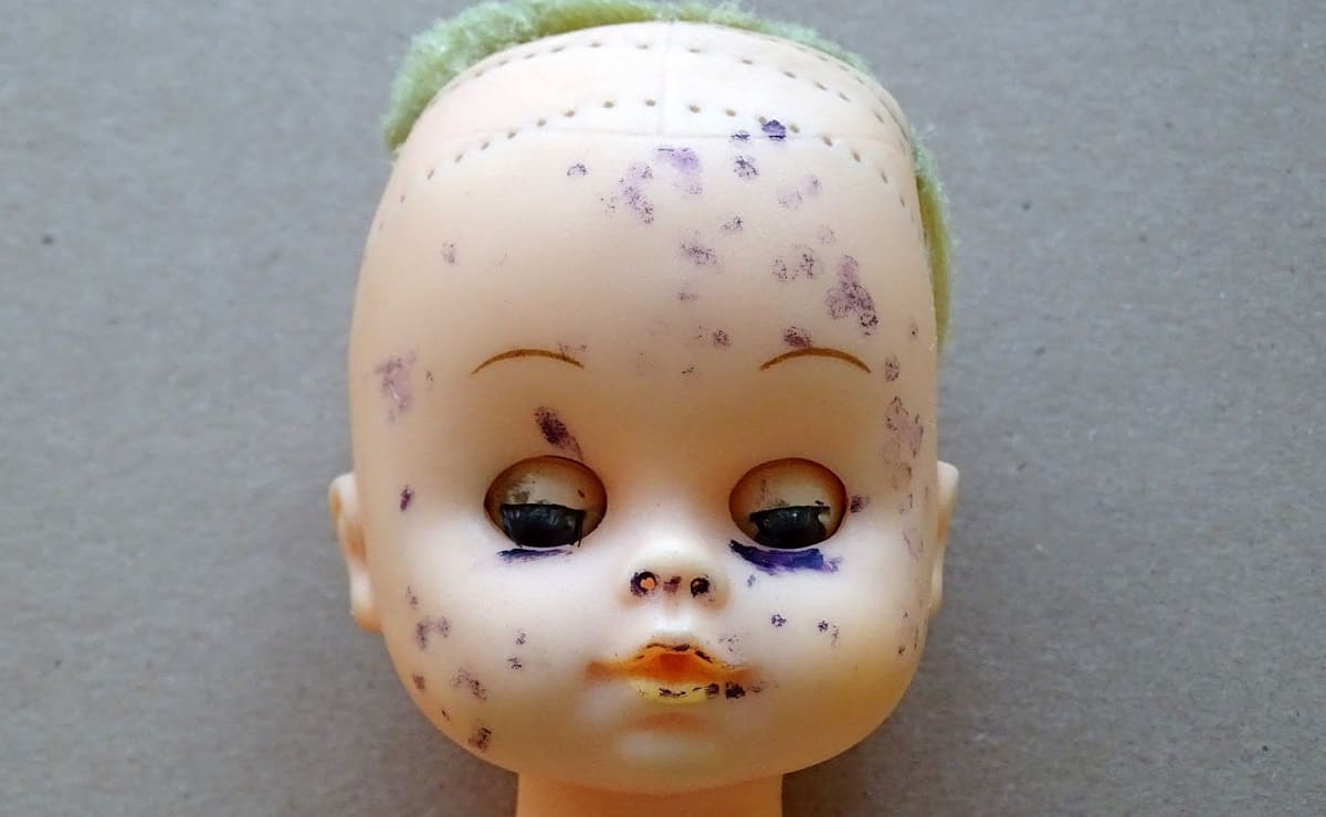clean the rubber|clean stained toy doll|remove ink stain from rubber mummy