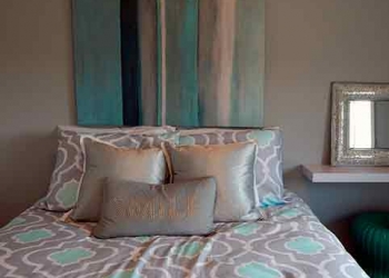 bed-without-headboard-and-blue-box