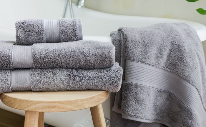 wash towels ammonia remove dampness odor