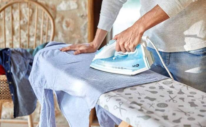 Ironing his clothes