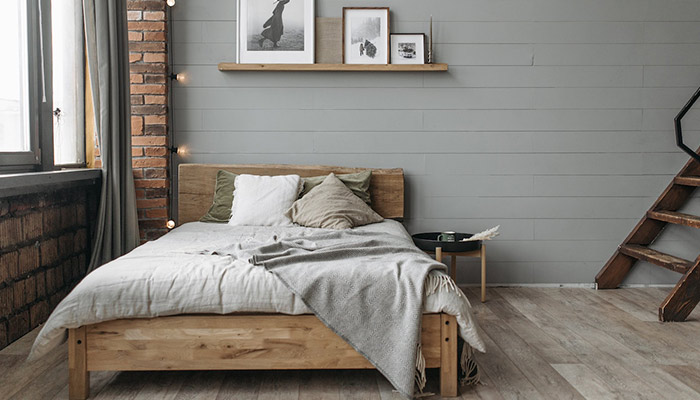 Dormitorio con cama estilo nórdico